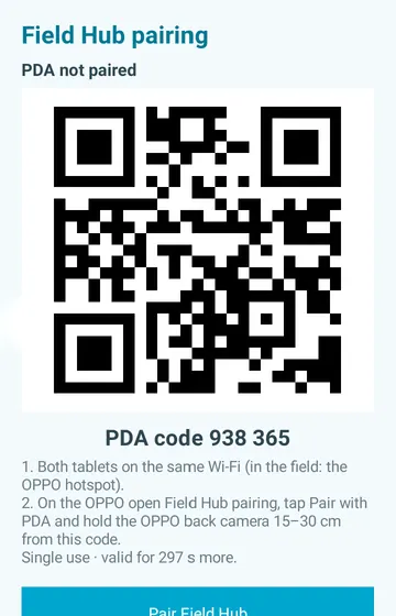Pair with the field tablet. The scanner tablet shows a one-time QR code for the field tablet to scan.